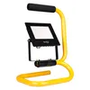 A yellow and black portable LED floodlight on a white background. Náhled obrázku produktu