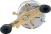 A close-up studio shot of a fishing reel against a white background. Voir les images du produit