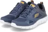 A pair of blue Skechers athletic shoes on a white background. Produktbild-Vorschau