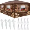 A brown gazebo with a printed image of a wooden chalet, including windows with curtains and flower boxes, and stacks of firewood. Below the gazebo are metal stakes and ropes, likely for assembly or securing the gazebo. Voir les images du produit