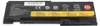 A black laptop battery with labels and markings. Produktbild-Vorschau