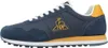 A side view of a blue and yellow Le Coq Sportif sneaker against a white background. Podgląd zdjęcia produktu