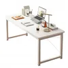 A white computer desk with various office supplies on it, including a laptop, books, a lamp, and a cup of coffee. Podgląd zdjęcia produktu
