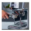 A close-up shot of a person using a Sage espresso machine. Produktbild-Vorschau
