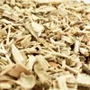 A close-up, detailed view of wood chips. Produktbild-Vorschau