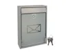 A silver mailbox with a frosted glass door and an envelope icon, along with two keys, is presented against a white background. Podgląd zdjęcia produktu