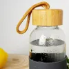 Butelka szklana z silikonową osłoną i drewnianym korkiem do Podgląd zdjęcia produktu 9