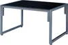 A coffee table with a black top and gray metal legs, shown from a slightly elevated side angle against a white background. Anteprima dell’immagine prodotto