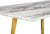 A close-up view of a table with a marble-look top and gold legs. Náhľad obrázku produktu