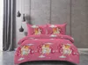 A pink unicorn-themed duvet cover and pillow set displayed on a bed. Produktbild-Vorschau