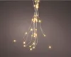 A string of LED lights hanging against a plain background. Náhled obrázku produktu