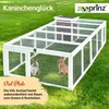 A rabbit run is set up on a grassy lawn with two rabbits inside. Produktbild-Vorschau