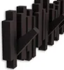 A wall-mounted coat rack with multiple hooks. Náhľad obrázku produktu