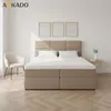 A bedroom setting with a bed, chair, and side table. Produktbild-Vorschau