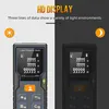A split image showing a laser distance meter in bright and dark environments, highlighting its display. Podgląd zdjęcia produktu
