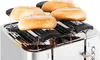 A toaster with four bread rolls on top. Produktbild-Vorschau