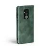 A green flip cover phone case is shown against a white background. Produktbild-Vorschau