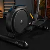 A close-up view of the main component of a black elliptical exercise machine. Produktbild-Vorschau