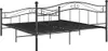 A black metal bed frame with a headboard and footboard, shown from a side angle against a white background. Podgląd zdjęcia produktu