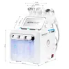 A white and blue cosmetic device with dimensions indicated by lines and measurements. Produktbild-Vorschau