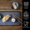 A close-up of sushi on a dark rectangular plate, with chopsticks and a small bowl of pickled ginger in the background. The right side of the image features icons and text related to product features. Produktbild-Vorschau