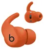 Two orange wireless earbuds are shown against a white background. Náhľad obrázku produktu