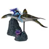 A toy action figure of a Na'vi character riding a sea creature, displayed on a rocky, coral-like base. Produktbild-Vorschau