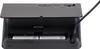 The back of a black digital alarm clock, showing the battery compartment with two AA batteries and the power cord plugged in. Produktbild-Vorschau