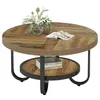 A round, two-tiered coffee table with a wood-grain finish and black metal legs, decorated with a vase of flowers and a magazine. Náhľad obrázku produktu