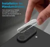 A hand is shown installing a camera lens protector onto a smartphone. Produktbild-Vorschau