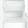 A close-up view of the interior of a white storage unit, possibly a bed or cabinet, with an open door revealing shelves. Náhľad obrázku produktu