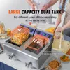A commercial kitchen scene with a dual-tank deep fryer. Produktbild-Vorschau