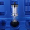 A clear, well-lit product shot of a coolant leak detector tool inside a blue plastic case. Podgląd zdjęcia produktu