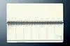 An open planner or calendar with a spiral binding. Podgląd zdjęcia produktu