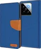 A blue flip case for a smartphone is shown open, revealing the phone's camera module. Produktbild-Vorschau