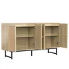 A light wood sideboard with cane detailing and black metal legs, shown with its doors open. Náhľad obrázku produktu