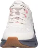 A close-up front view of a beige Skechers sneaker. Produktbild-Vorschau