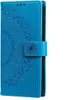 A blue flip case for a Samsung Galaxy A54 5G with a mandala pattern embossed on the cover. Produktbild-Vorschau