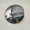 A chrome shower head is shown from a top-down angle against a white background. Produktbild-Vorschau