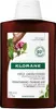 A bottle of Klorane shampoo with botanical illustrations. Podgląd zdjęcia produktu