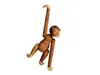 A wooden monkey toy hanging from an unseen object. Anteprima dell’immagine prodotto