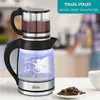 A Zilan electric kettle with a teapot attachment, boiling water with blue LED lights, placed on a countertop with tea leaves and a cup nearby. A blurred background shows a kitchen setting. Anteprima dell’immagine prodotto