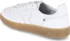 A white leather sneaker with a gum sole is shown from a side-rear angle. Produktbild-Vorschau