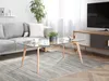 A living room scene featuring a couch, coffee table, and TV stand. Náhľad obrázku produktu