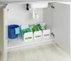 Cleaning supplies organized in a cabinet under a sink. Produktbild-Vorschau