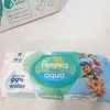 A package of Pampers Harmonie Aqua baby wipes with Paw Patrol characters on it, placed on a light-colored surface. Náhľad obrázku produktu