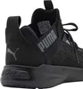 A close-up side view of a black Puma sneaker. Voir les images du produit
