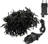 A bundle of black LED string lights with two power adapters on a white background. Náhled obrázku produktu