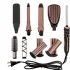 A collection of hair styling attachments and a handle are arranged on a white background. Produktbild-Vorschau