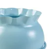 A close-up view of the top rim of a light blue planter. Produktbild-Vorschau